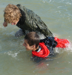 cagoule and jeans for survival swimming