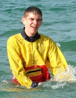 beach surf squats fully clothed with lifeguard anorak cagoule